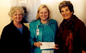 Molly Knazek, President of TRAA; Darlene Brown, Executive Director, PIE; and Dee Mayer, Chair of the Art Teacher Fund of TRAA