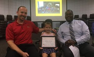 Award presentation to Addison McCoy